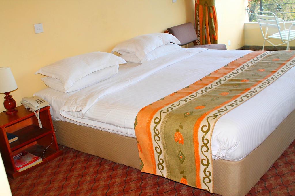 Kivi Milimani Hotel Найроби Номер фото